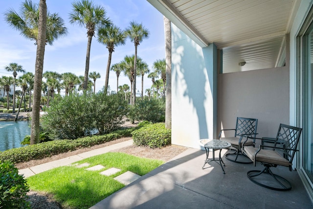 view of patio featuring a water view