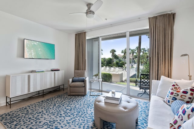 tiled living room featuring ceiling fan