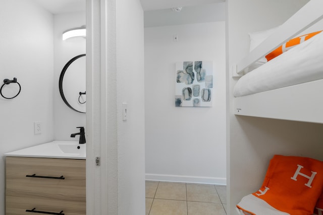 bathroom featuring vanity and tile patterned flooring