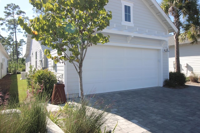 exterior space with a garage