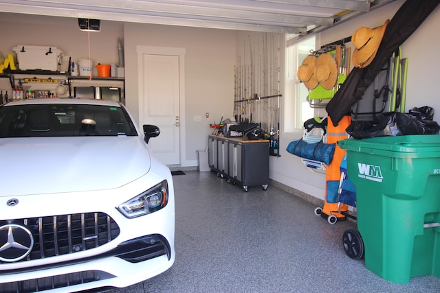 garage featuring a garage door opener