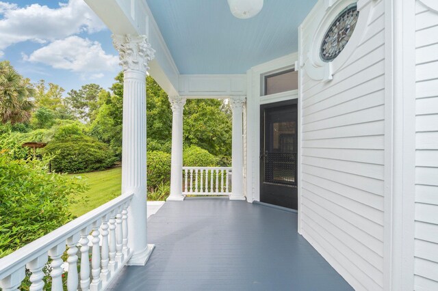 view of patio featuring a porch