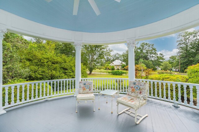 exterior space featuring ceiling fan