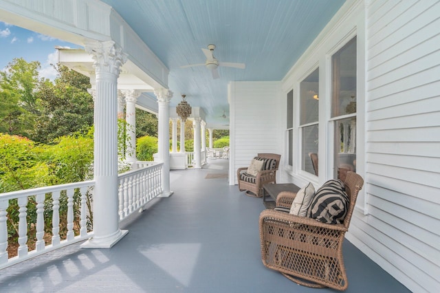 view of patio featuring ceiling fan and covered porch