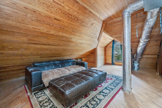 bedroom featuring hardwood / wood-style flooring, vaulted ceiling, wood walls, and wooden ceiling