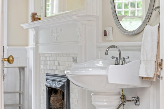 bathroom with a fireplace