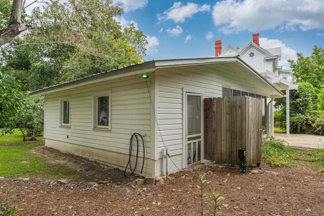 view of home's exterior featuring a patio