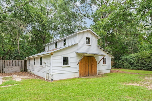 exterior space featuring a front lawn