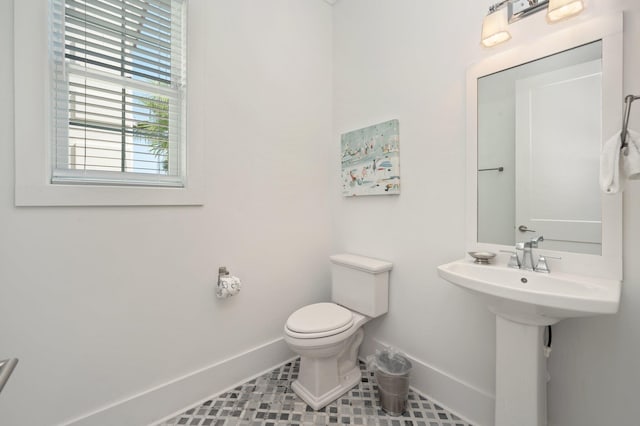 4795 Ocean Blvd, Destin, FL 32541 - half bath featuring baseboards and tile patterned flooring
