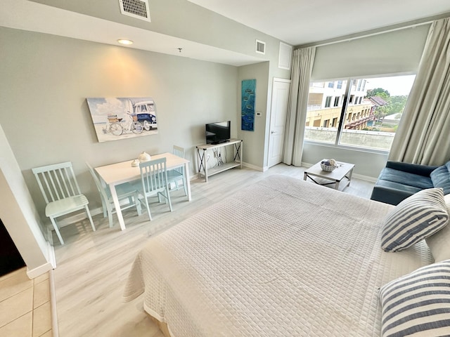 5002 S Sandestin Blvd # 6322, Miramar Beach, FL 32550 - bedroom with baseboards and wood finished floors