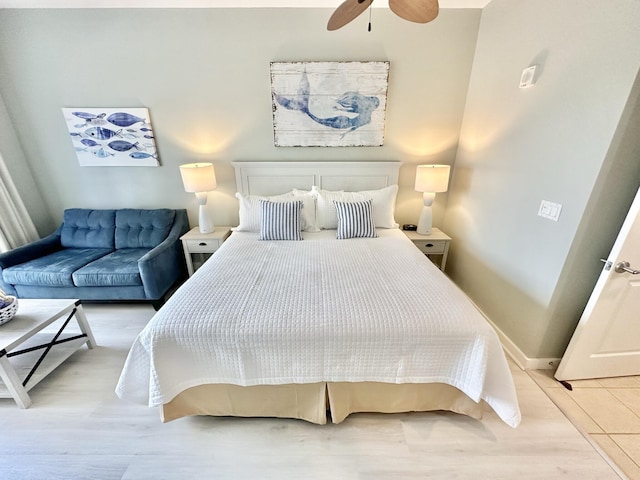 5002 S Sandestin Blvd # 6322, Miramar Beach, FL 32550 - bedroom with baseboards and light wood-style flooring