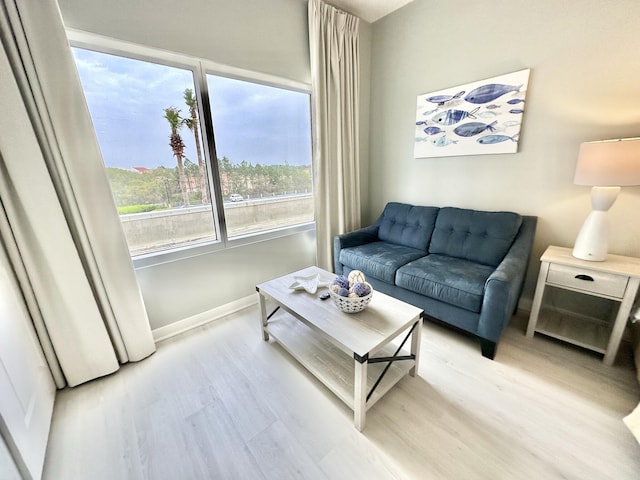 5002 S Sandestin Blvd # 6322, Miramar Beach, FL 32550 - living area featuring light wood-style flooring and baseboards