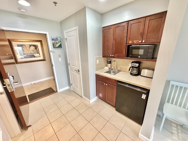 5002 S Sandestin Blvd # 6322, Miramar Beach, FL 32550 - kitchen with black microwave, dishwasher, backsplash, light countertops, and light tile patterned floors