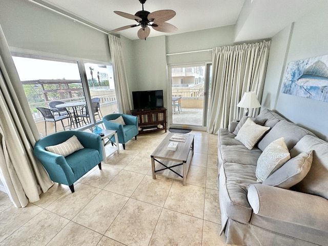 5002 S Sandestin Blvd # 6322, Miramar Beach, FL 32550 - living area with ceiling fan, healthy amount of natural light, and light tile patterned floors