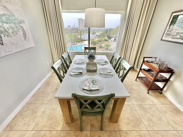 5002 S Sandestin Blvd # 6322, Miramar Beach, FL 32550 - dining area featuring baseboards and light tile patterned floors