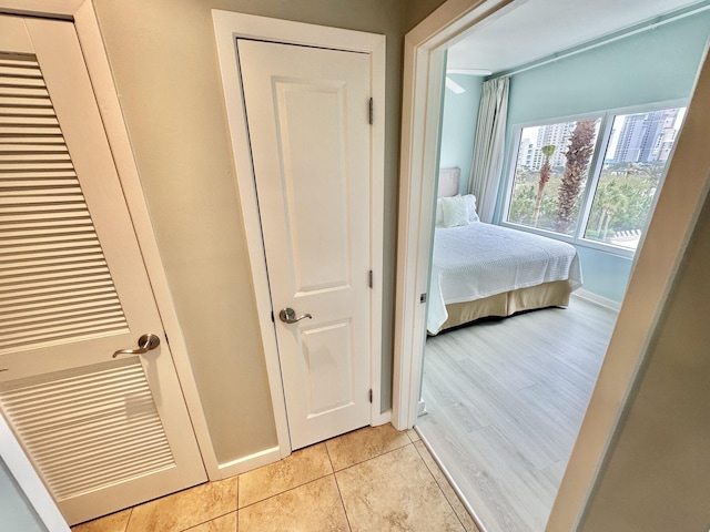 5002 S Sandestin Blvd # 6322, Miramar Beach, FL 32550 - bedroom with light tile patterned flooring and baseboards