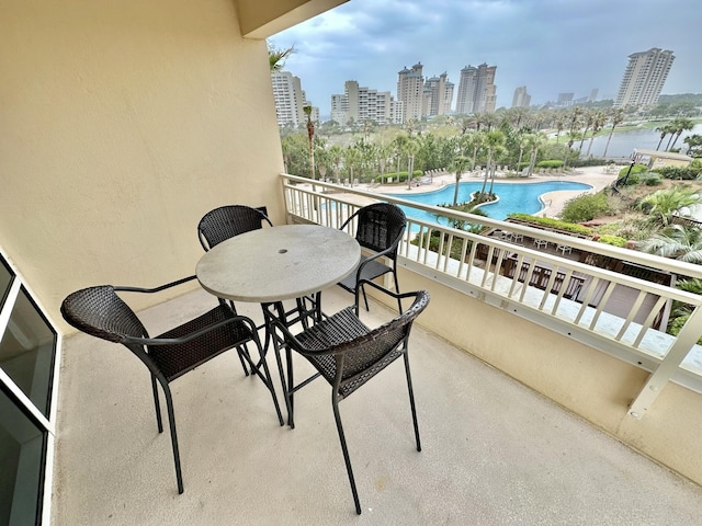 5002 S Sandestin Blvd # 6322, Miramar Beach, FL 32550 - balcony with a skyline view and view of pool