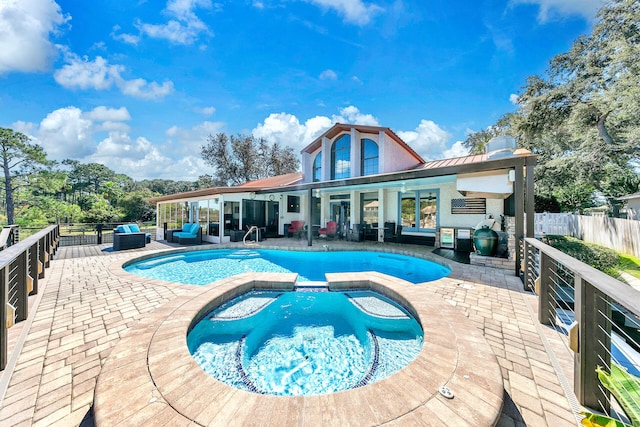 view of swimming pool featuring ceiling fan, an in ground hot tub, a patio area, and outdoor lounge area