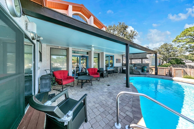 view of swimming pool featuring a patio