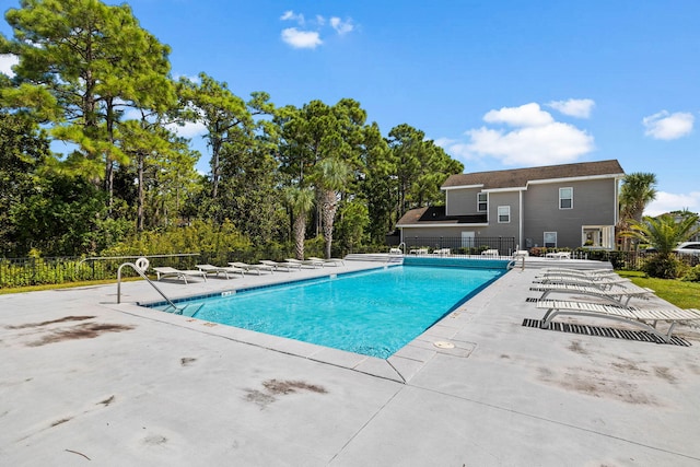 view of pool featuring a patio area