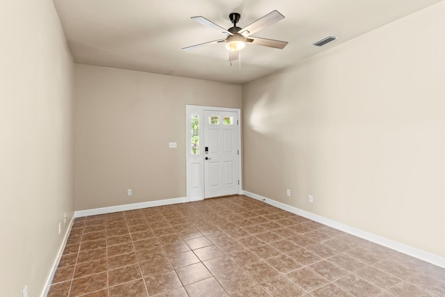 foyer featuring ceiling fan