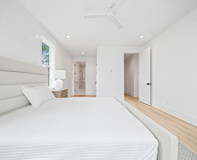 bedroom featuring ceiling fan and light wood-type flooring