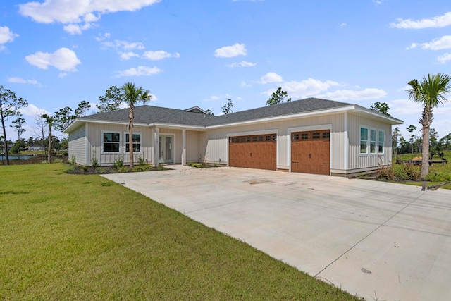 single story home with a front lawn and a garage