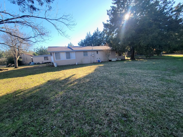 exterior space with a front yard