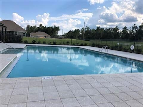 community pool with fence