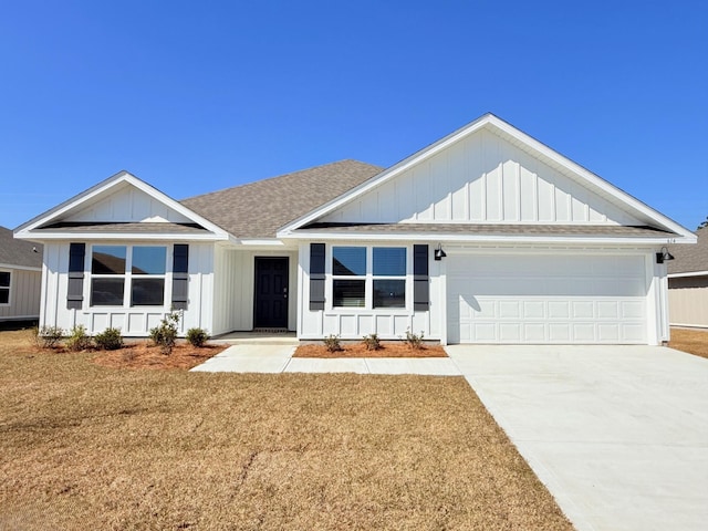 single story home featuring board and batten siding, roof with shingles, driveway, and a garage