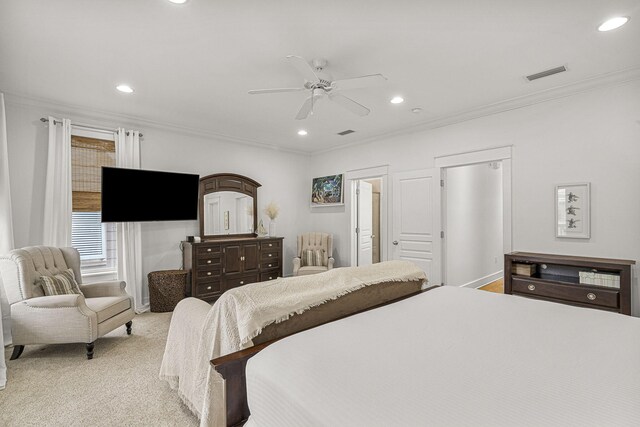 bedroom with ceiling fan, recessed lighting, light carpet, visible vents, and ornamental molding