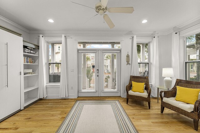 interior space featuring french doors, plenty of natural light, and a ceiling fan