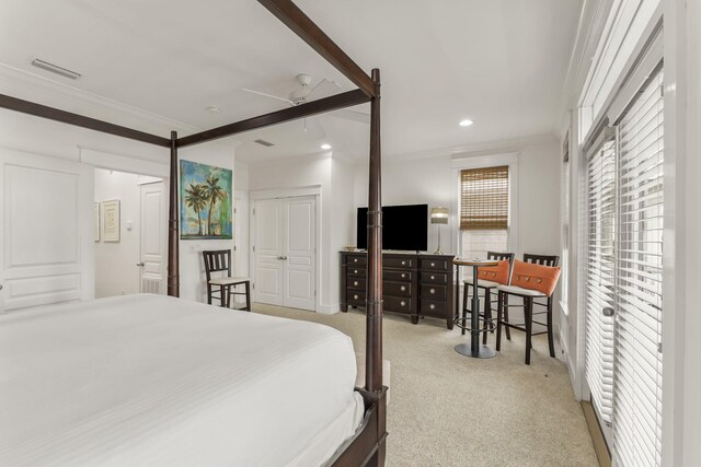 bedroom featuring carpet floors, ornamental molding, visible vents, and recessed lighting