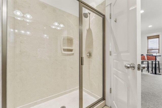 bathroom featuring a shower stall