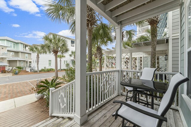 wooden deck featuring a residential view