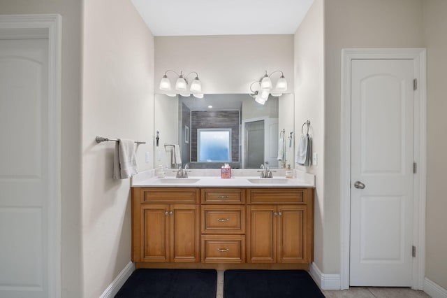 bathroom with vanity and tile patterned floors