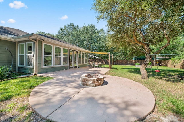 view of patio featuring a fire pit