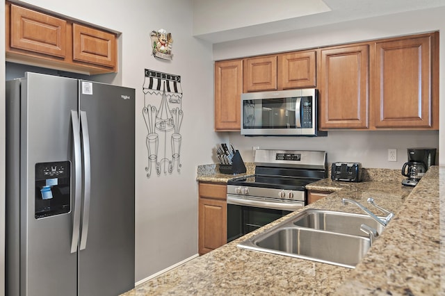 kitchen with stainless steel appliances and sink