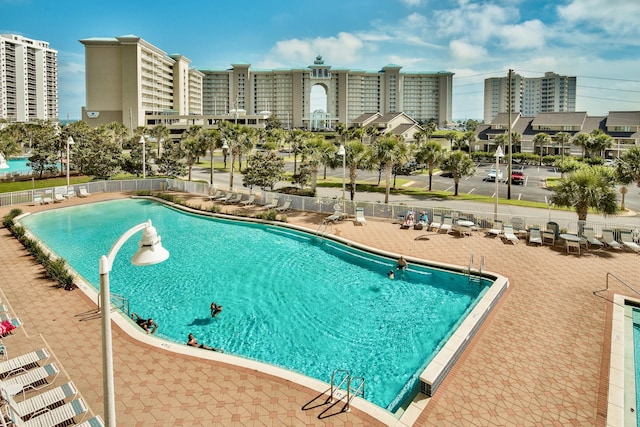 view of pool featuring a patio