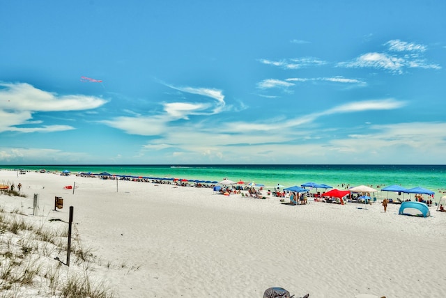 property view of water featuring a beach view