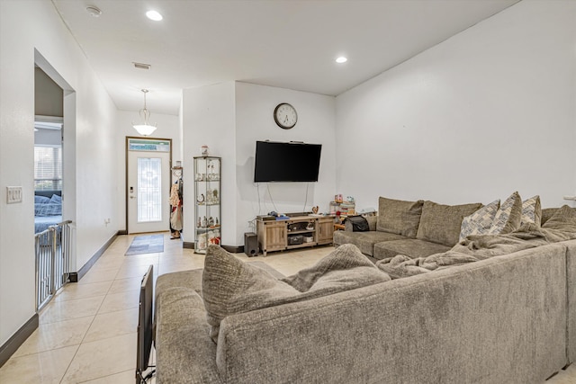 living room with light tile patterned floors