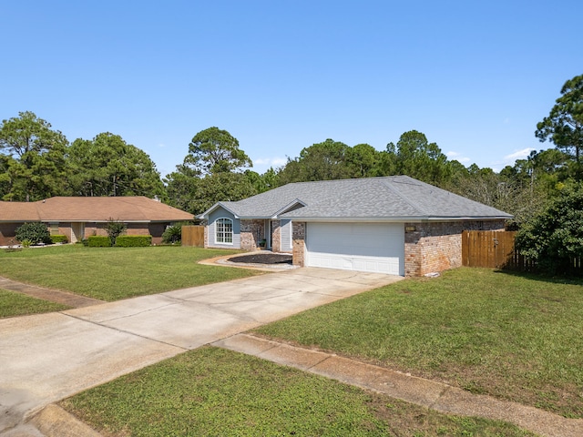 single story home with a front yard and a garage