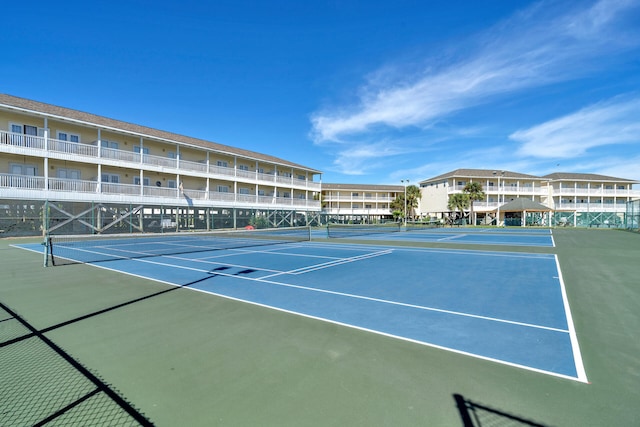 view of tennis court with basketball court