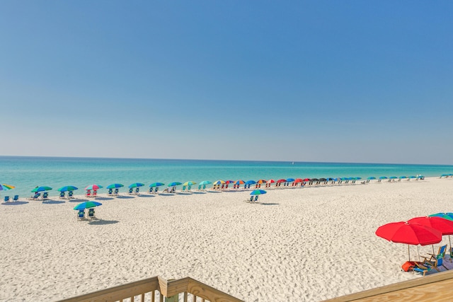 property view of water featuring a beach view