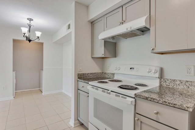 kitchen featuring hanging light fixtures, a chandelier, white electric range, gray cabinets, and dark stone counters