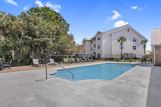 view of swimming pool featuring a patio