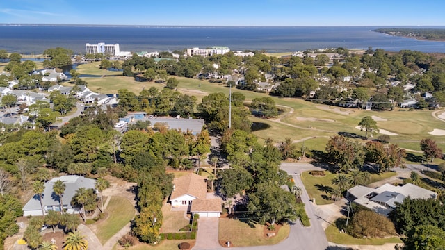 aerial view with view of golf course and a water view
