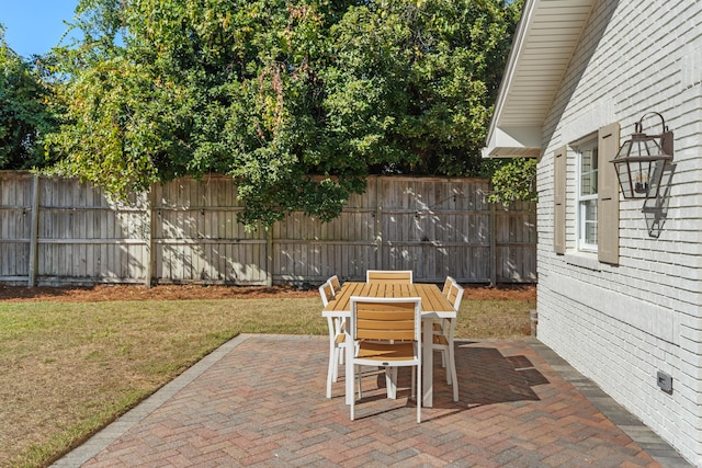 view of patio / terrace with fence and outdoor dining space