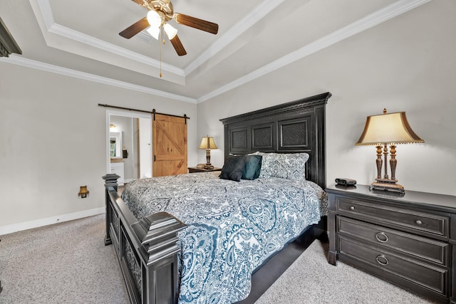 bedroom featuring light carpet, ceiling fan, a raised ceiling, and a barn door