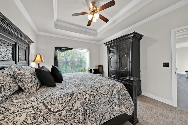 bedroom featuring ceiling fan, carpet floors, and crown molding